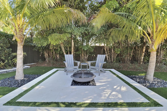 view of patio / terrace with an outdoor fire pit