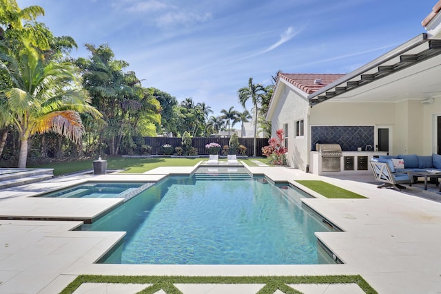 view of swimming pool with a lawn, a grill, area for grilling, an in ground hot tub, and a patio