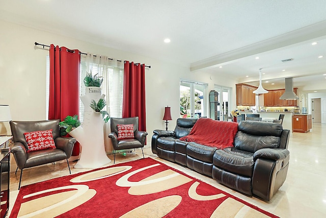 tiled living room featuring beam ceiling