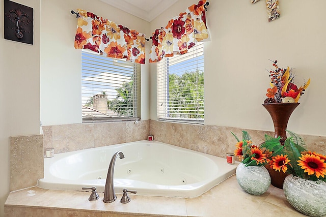 bathroom with tiled bath