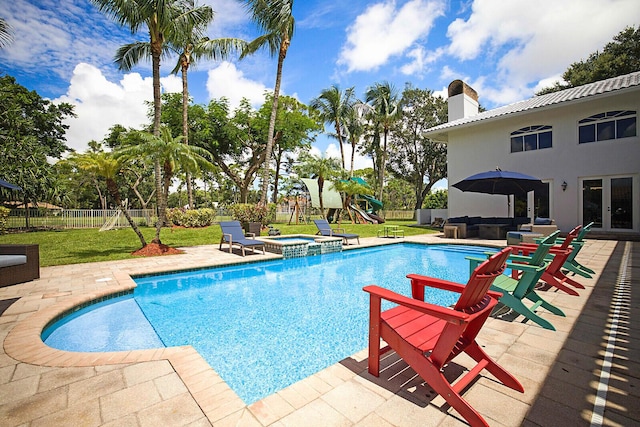 view of pool with french doors, an outdoor hangout area, a patio area, a playground, and a lawn