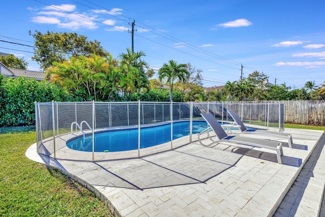 view of pool featuring a patio area