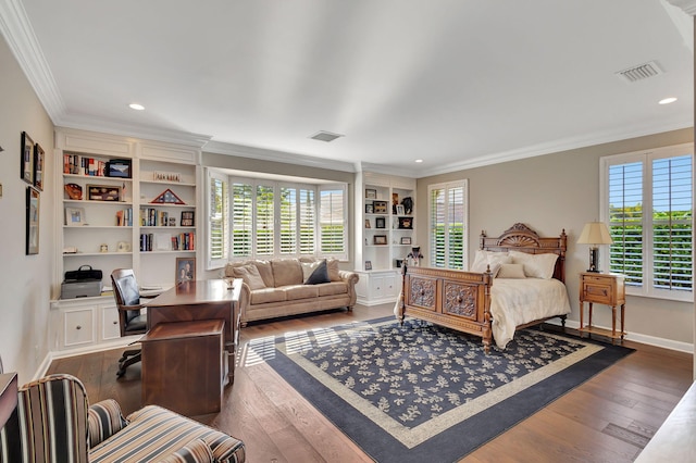 bedroom featuring multiple windows, crown molding, and dark hardwood / wood-style flooring