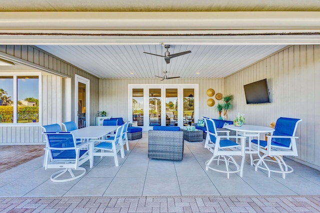 view of patio / terrace with an outdoor living space and ceiling fan