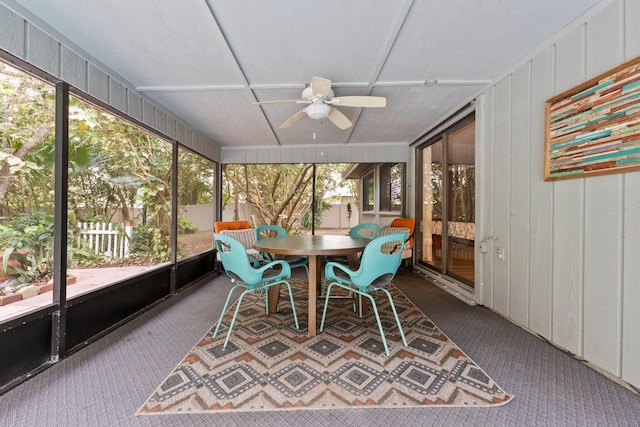 sunroom / solarium with ceiling fan