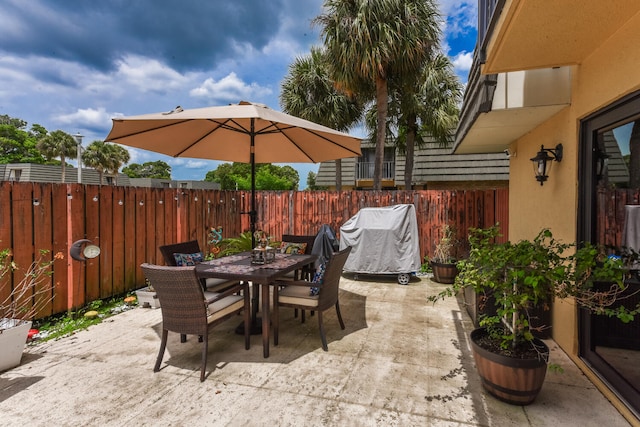 view of patio / terrace with a grill