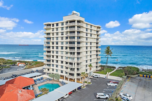 view of building exterior featuring a water view