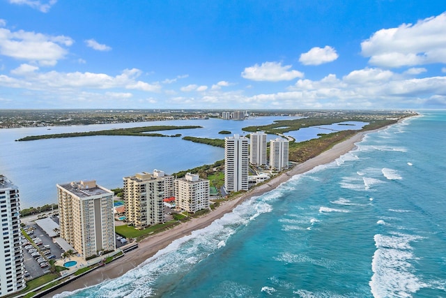 aerial view featuring a water view and a beach view