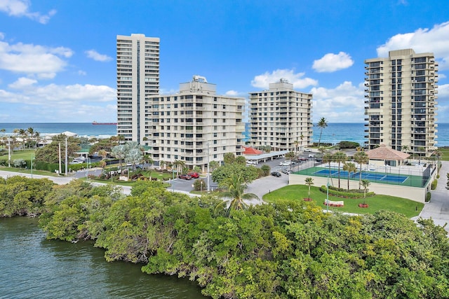 birds eye view of property featuring a water view