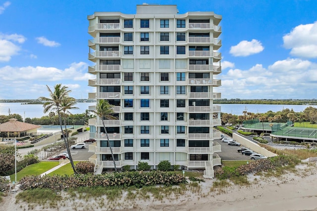 view of building exterior featuring a water view