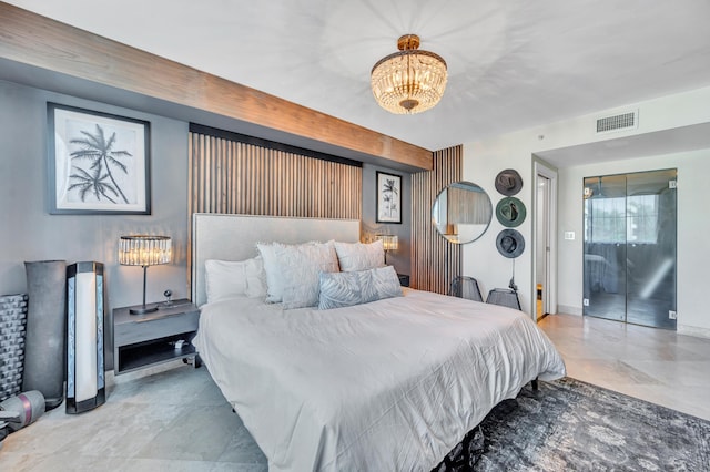 bedroom featuring a notable chandelier and beam ceiling