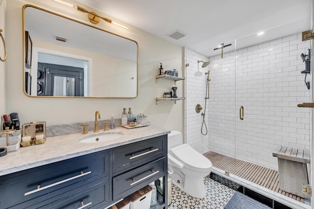 bathroom featuring vanity, toilet, and walk in shower