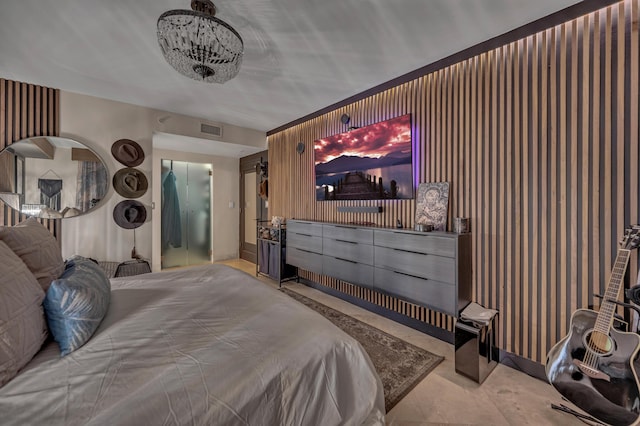 bedroom with wooden walls