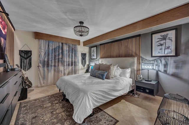 bedroom featuring a chandelier