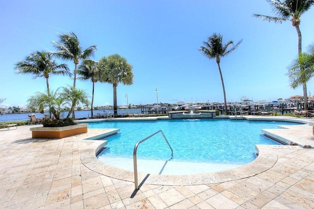 view of swimming pool featuring a patio