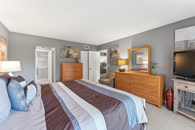 bedroom with light colored carpet