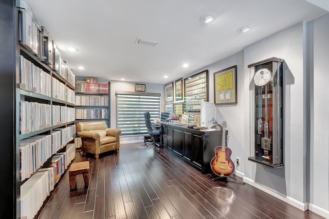 sitting room featuring dark hardwood / wood-style flooring