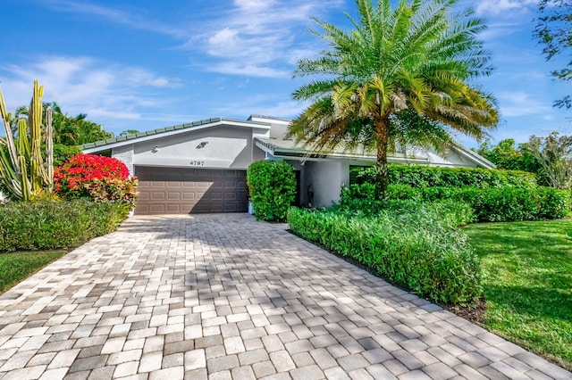 view of front of house with a garage