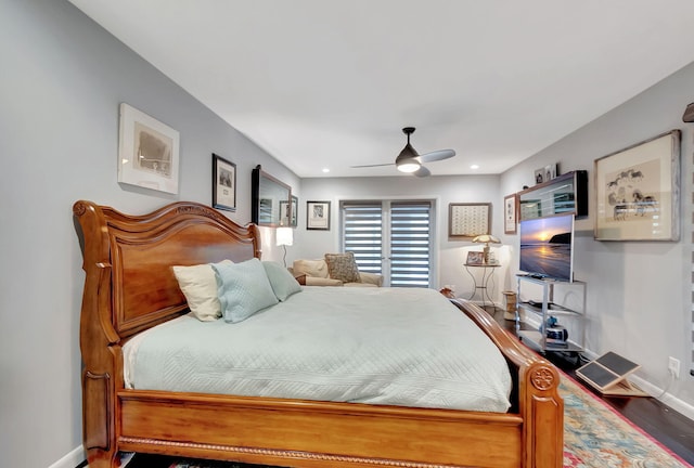 bedroom featuring ceiling fan and wood-type flooring