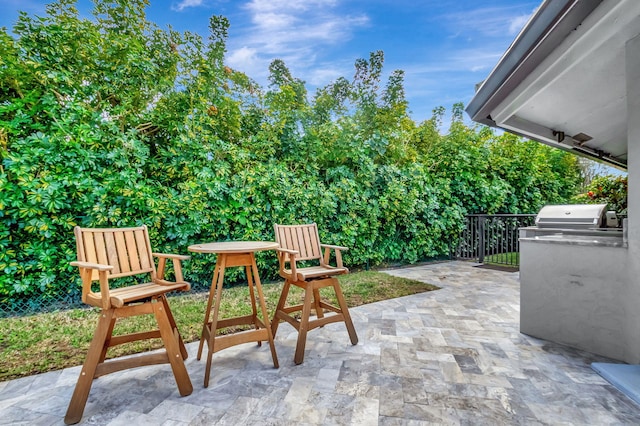 view of patio / terrace featuring a grill