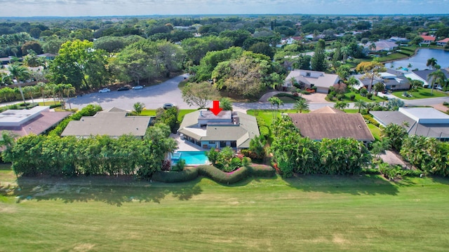 birds eye view of property featuring a water view