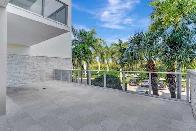 view of patio with a balcony