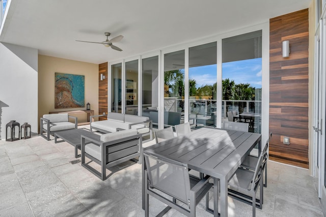 view of patio featuring ceiling fan and outdoor lounge area