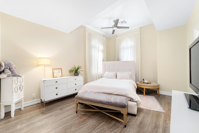 bedroom featuring ceiling fan and light hardwood / wood-style floors