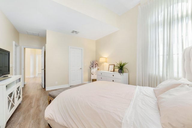 bedroom featuring light hardwood / wood-style flooring