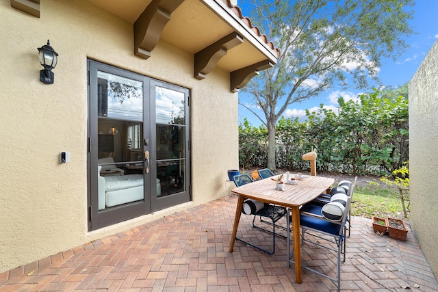 view of patio featuring french doors