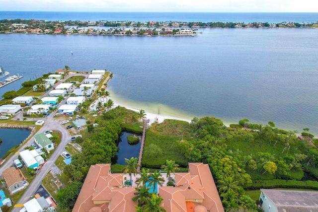 drone / aerial view with a water view