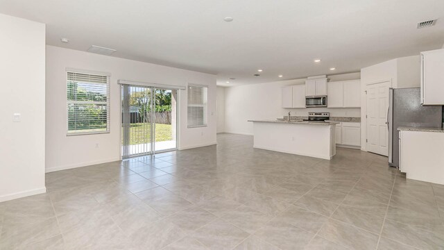 view of tiled spare room