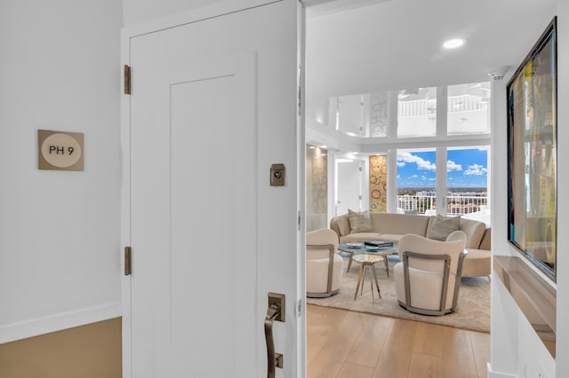 living room with light hardwood / wood-style floors