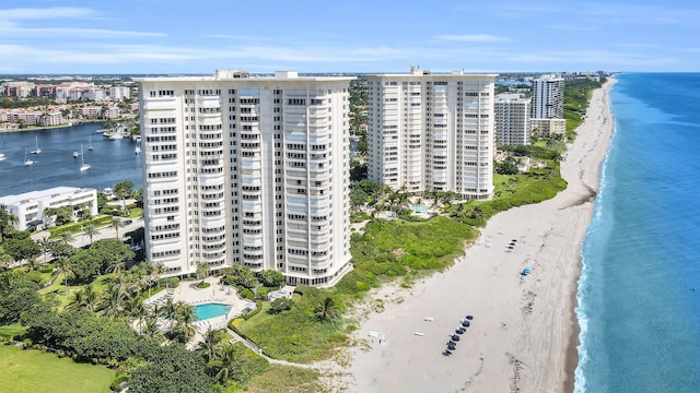 drone / aerial view with a view of the beach and a water view