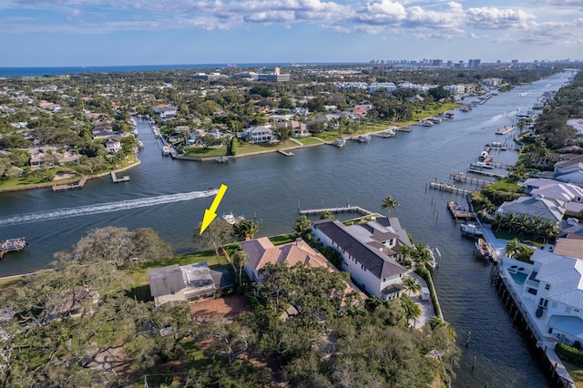 birds eye view of property featuring a water view