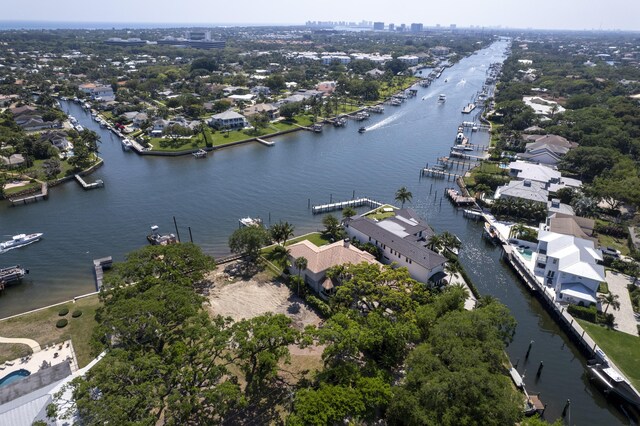 dock area featuring a water view and a yard