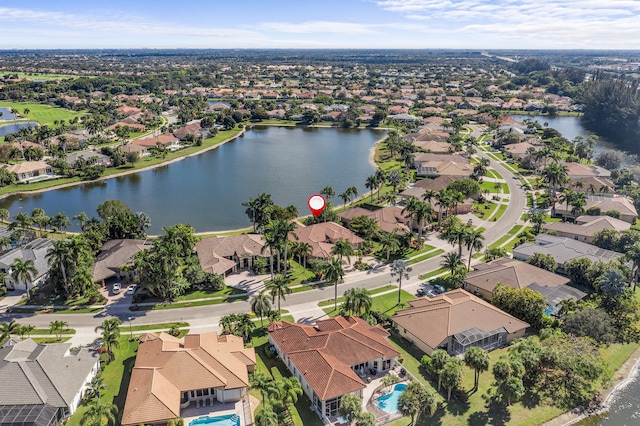 drone / aerial view with a water view