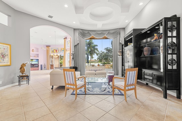 sitting room with light tile patterned floors