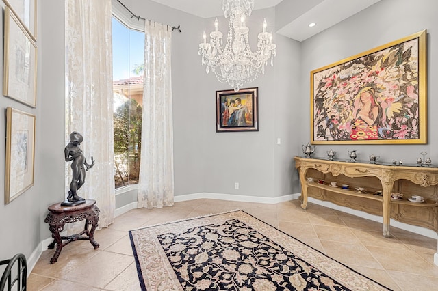 entrance foyer with an inviting chandelier and light tile patterned floors