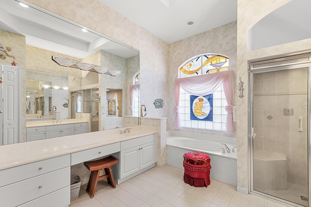 bathroom featuring vanity, tile patterned floors, and independent shower and bath