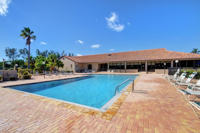 view of pool featuring a patio area