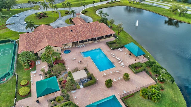 birds eye view of property featuring a water view