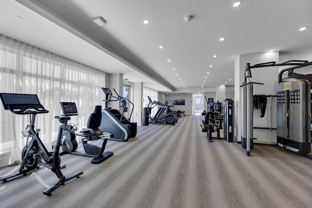 workout area with light colored carpet