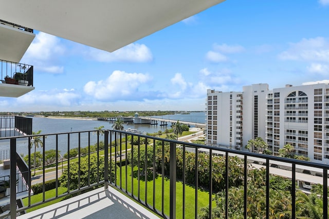 balcony featuring a water view