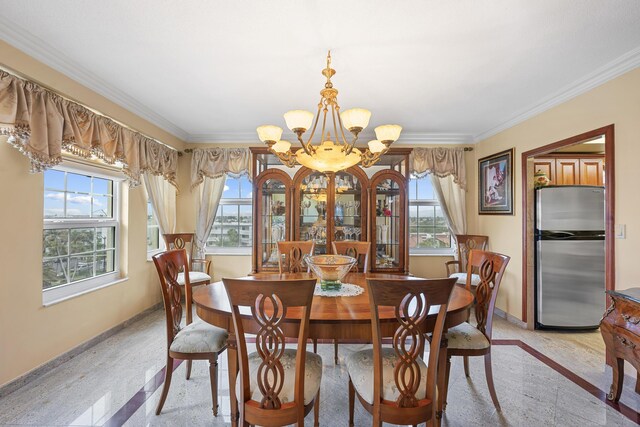 dining space with an inviting chandelier and crown molding