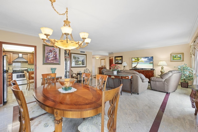 dining area featuring crown molding and a notable chandelier