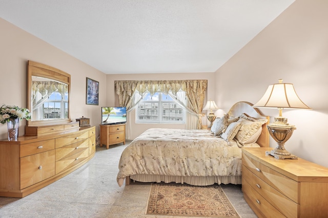 bedroom featuring multiple windows