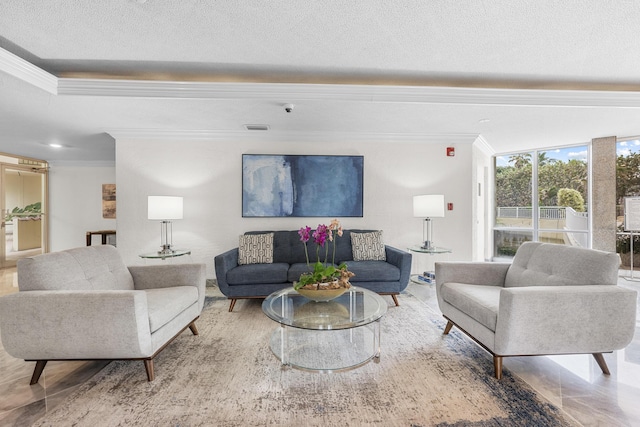 living room with a textured ceiling and ornamental molding