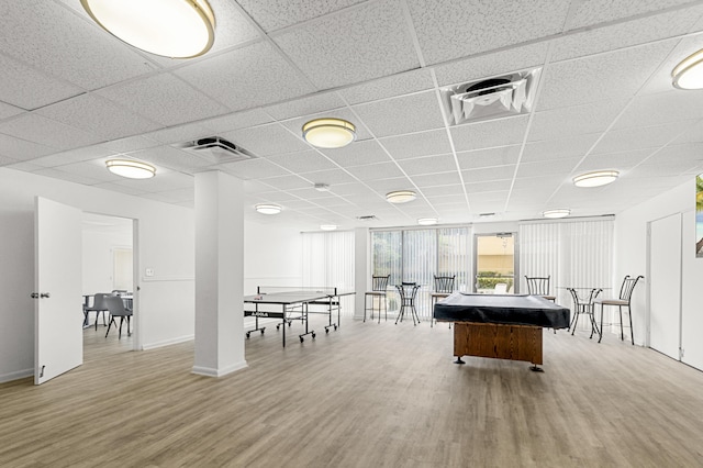 recreation room featuring a drop ceiling, pool table, and hardwood / wood-style floors