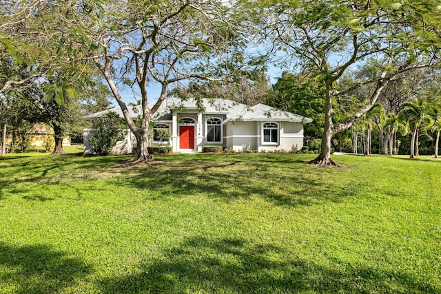 view of front facade with a front lawn